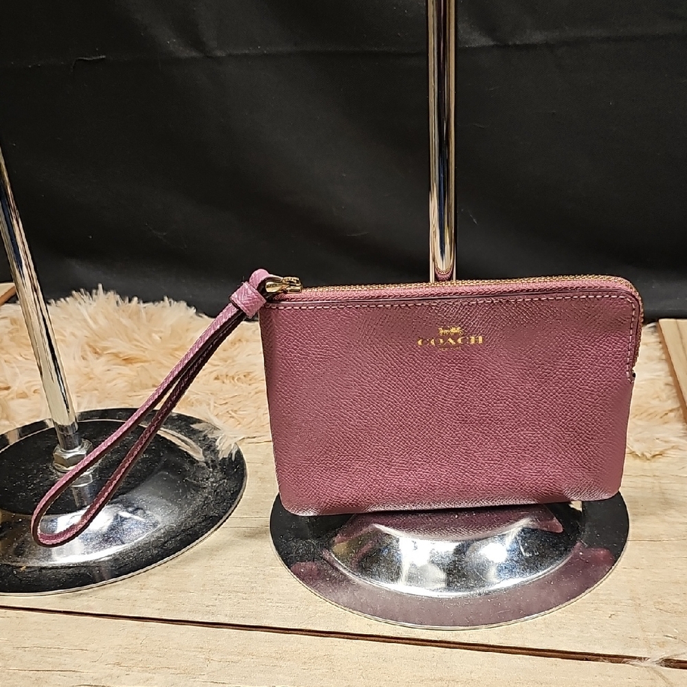 COACH Plum Leather Wristlet with Gold Logo